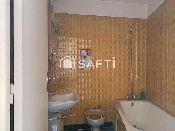 Ensemble immobilier en pierre au cœur de Saint-Félicien