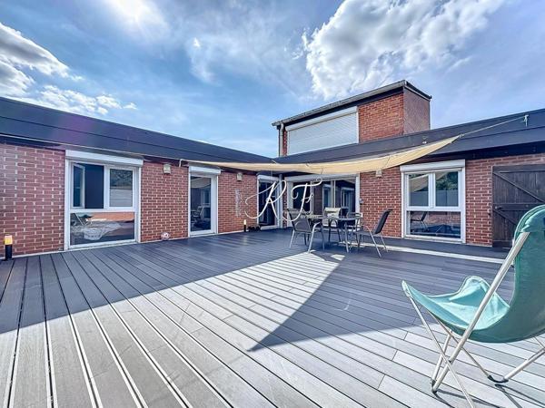 maison surélevée avec grande terrasse sans vis-à-vis