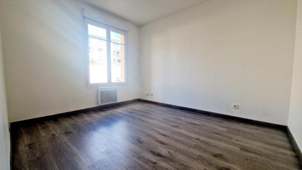 Appartement RDC avec jardin, parking et box- 2 chambres - centre ville