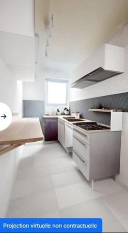 Appartement RDC avec jardin, parking et box- 2 chambres - centre ville