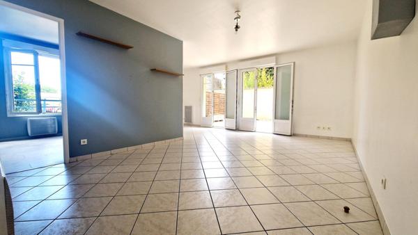 Appartement RDC avec jardin, parking et box- 2 chambres - centre ville