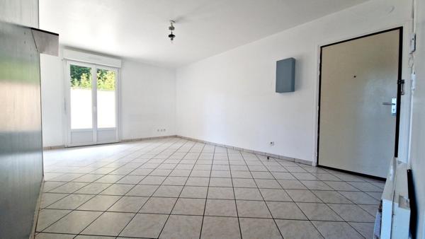 Appartement RDC avec jardin, parking et box- 2 chambres - centre ville