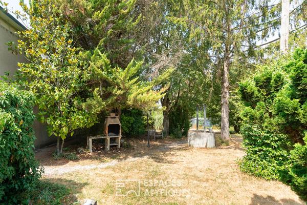 Maison de plain pied avec jardin arboré de 1400m²
