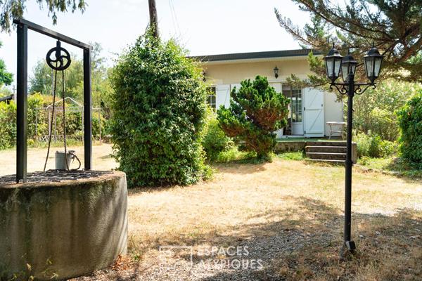 Maison de plain pied avec jardin arboré de 1400m²