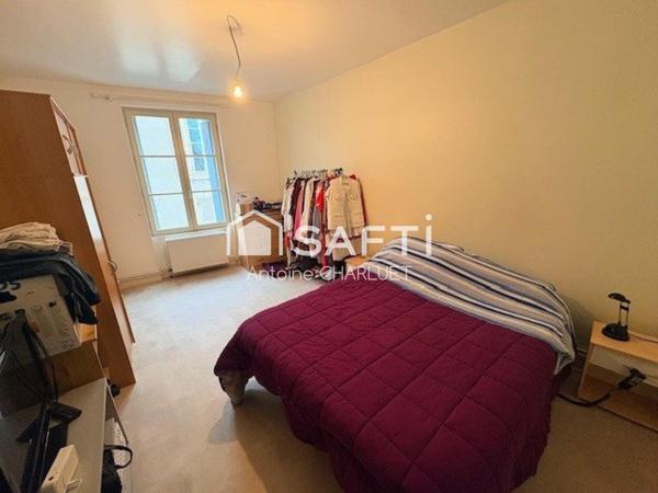 Bureau de 60m² avec un appartement de 72m² en centre ville