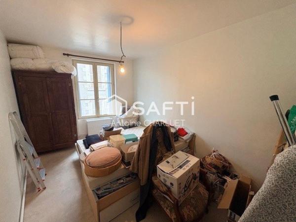 Bureau de 60m² avec un appartement de 72m² en centre ville