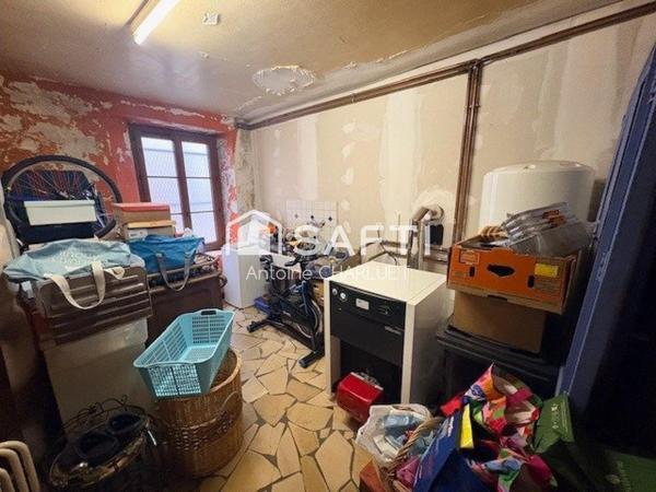 Bureau de 60m² avec un appartement de 72m² en centre ville