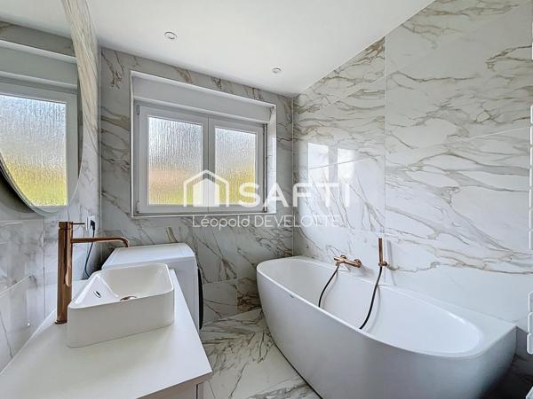 Superbe appartement avec terrasse et stationnement