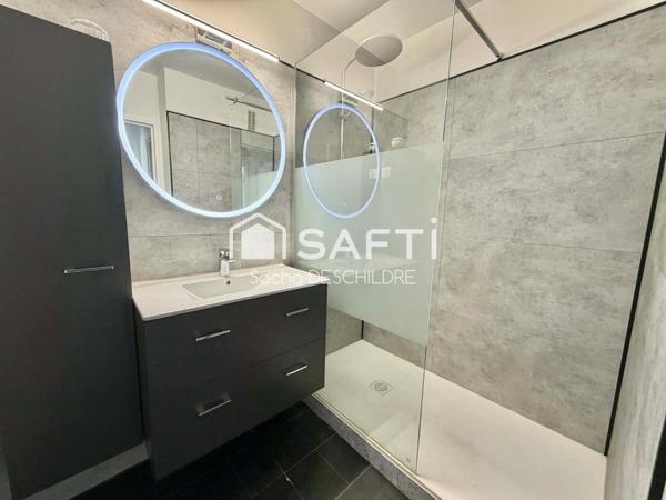 Appartement avec balcon, cave et stationnement – Saint-Remi