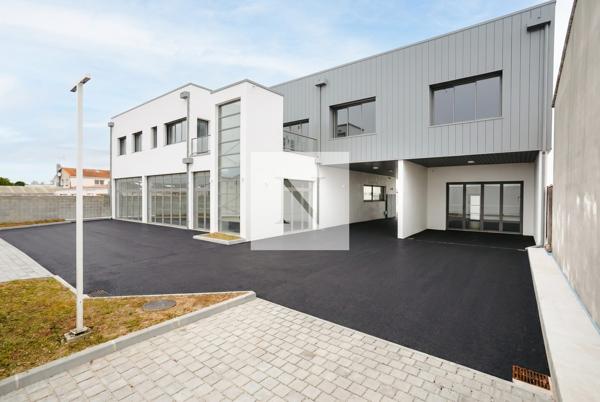 Plateau bureaux 150 m² modulable RE2020 — Lagord, 3 min La Rochelle