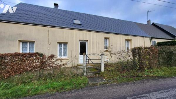 Maison sur 3704 m² avec dépendances en briques.