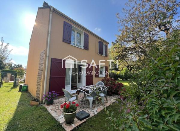 Maison familiale spacieuse avec jardin et garage