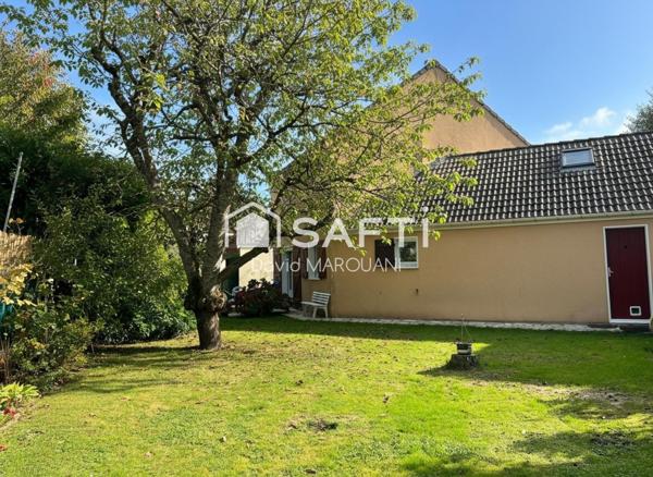 Maison familiale spacieuse avec jardin et garage