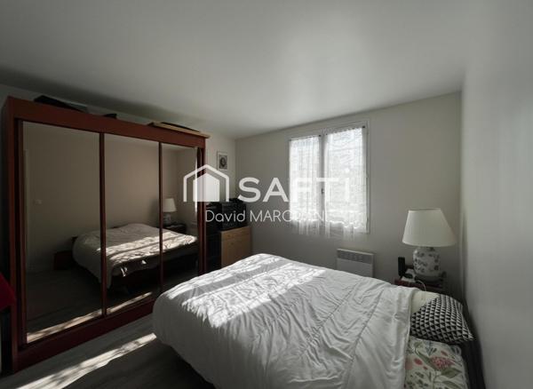 Maison familiale spacieuse avec jardin et garage