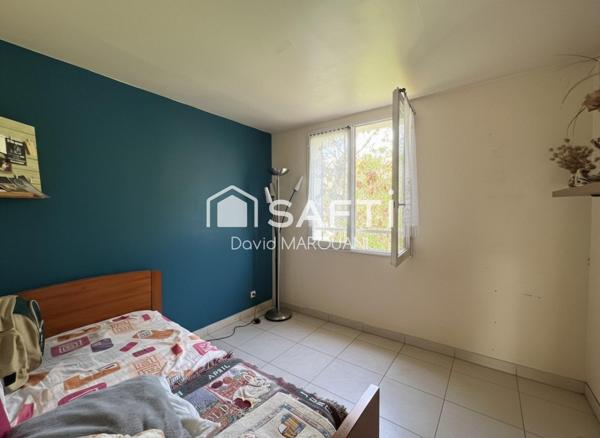 Maison familiale spacieuse avec jardin et garage