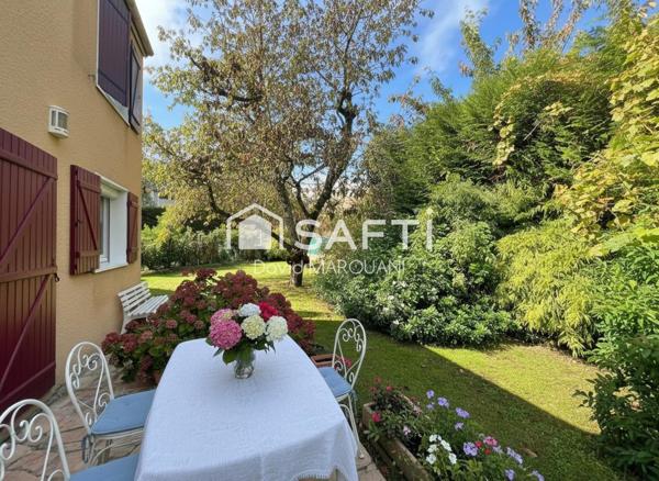 Maison familiale spacieuse avec jardin et garage
