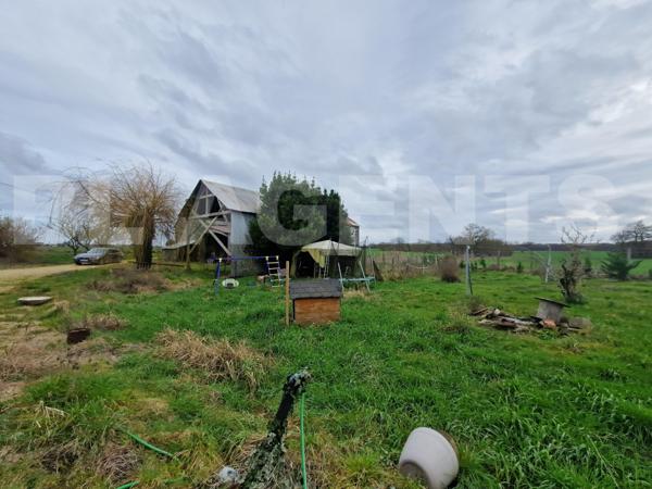 Maison avec dépendances et grand terrain - Fort potentiel