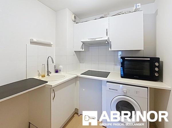 Appartement T2 Loué – 41 m² – Balcon – Parking – Proche commodités RUE