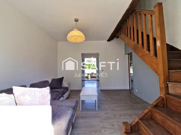 "Vivez au calme, entouré de verdure et proche du centre."