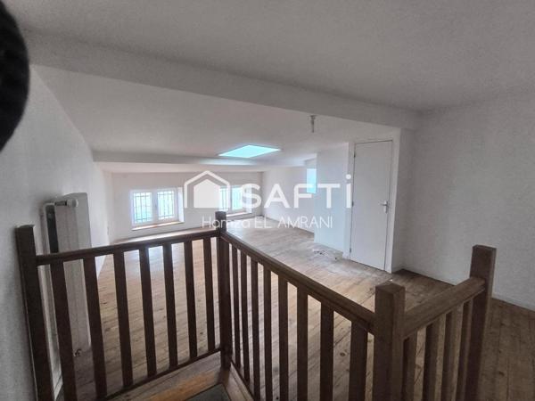 Jolie petite maison de ville mitoyenne