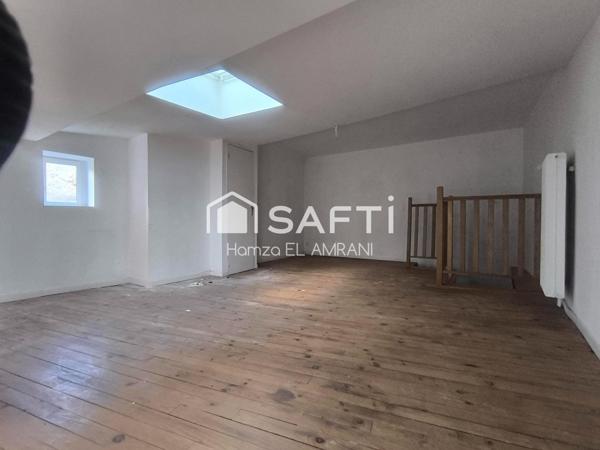 Jolie petite maison de ville mitoyenne