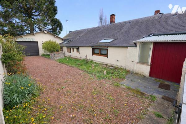 Maison individuelle idéale pour famille ou projet de deux logements – Garage et terrain clos.