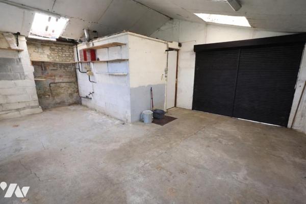 Maison individuelle idéale pour famille ou projet de deux logements – Garage et terrain clos.