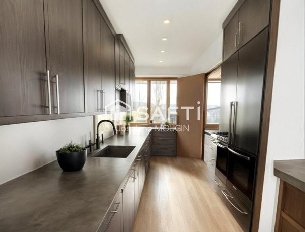 Appartement 2 chambres, balcon, cave.