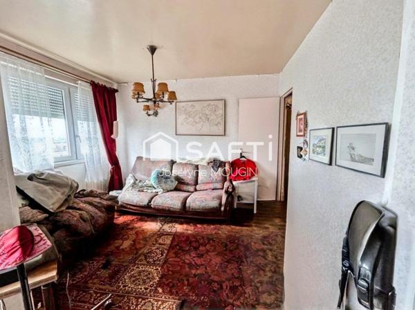 Appartement 2 chambres, balcon, cave.