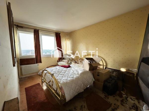 Appartement 2 chambres, balcon, cave.