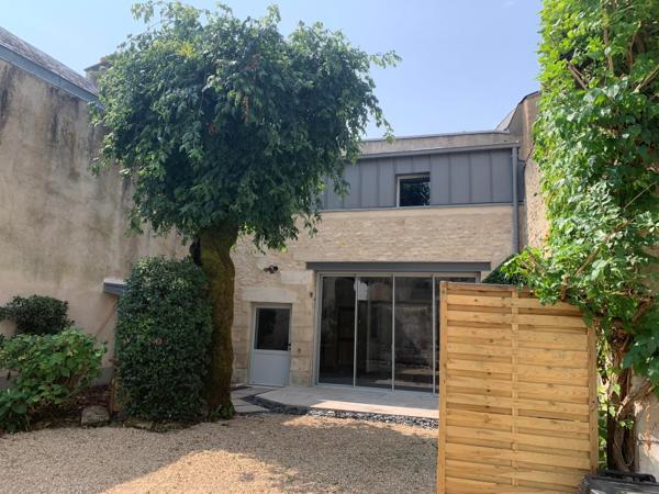 Maison de ville rénovée avec jardin et parking en centre ville de Poitiers