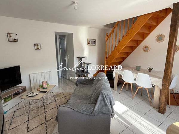 Immeuble composé de 2 logements : type T2  et T3