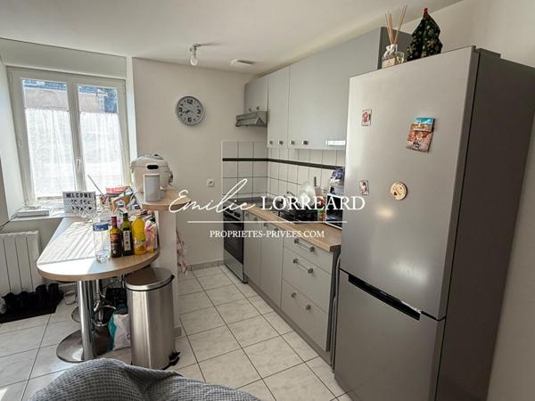 Immeuble composé de 2 logements : type T2  et T3