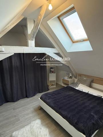 Immeuble composé de 2 logements : type T2  et T3