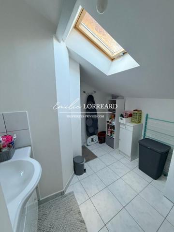 Immeuble composé de 2 logements : type T2  et T3