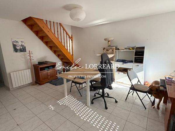 Immeuble composé de 2 logements : type T2  et T3