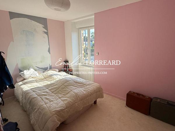 Immeuble composé de 2 logements : type T2  et T3