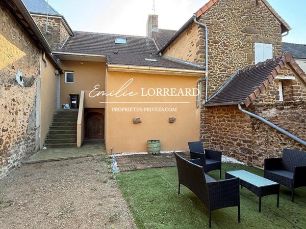 Immeuble composé de 2 logements : type T2  et T3