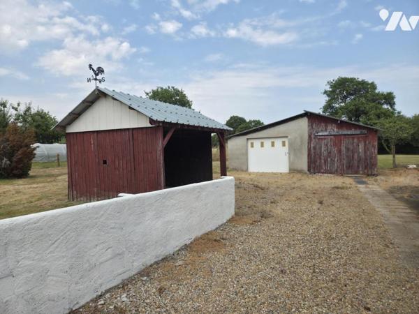 Maison plain-pied sur un terrain de 1.568m² avec dépendances