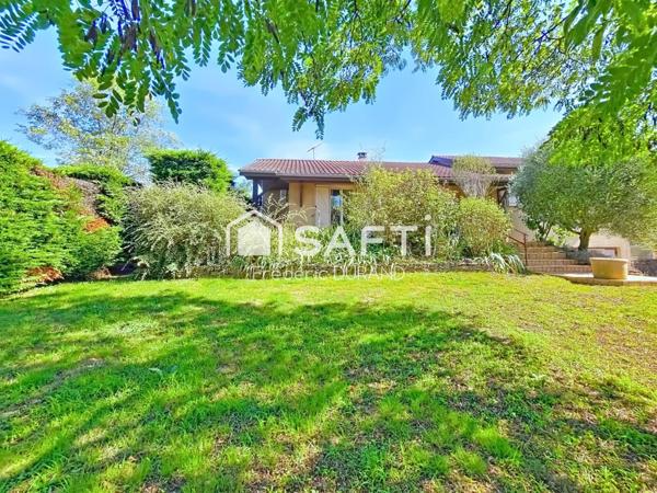 Maison avec grand sous-sol piscine climatisation