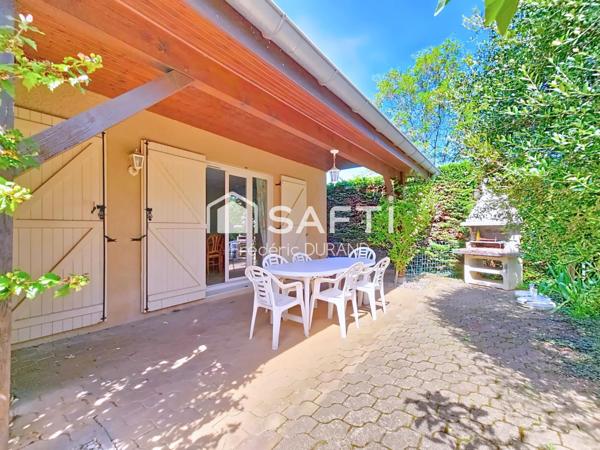 Maison avec grand sous-sol piscine climatisation