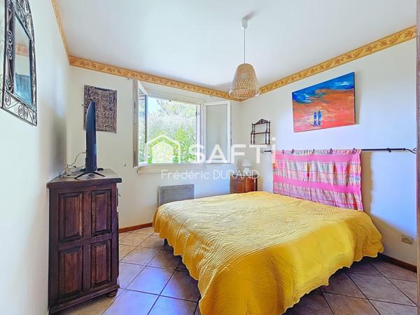 Maison avec grand sous-sol piscine climatisation