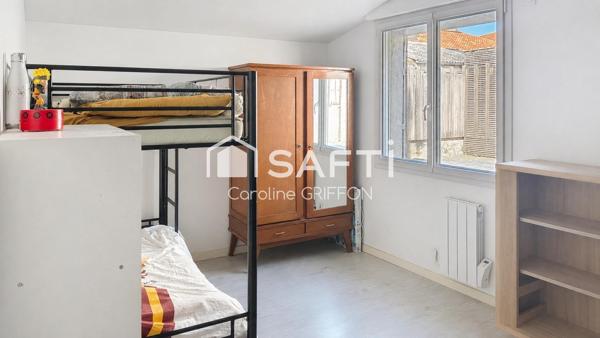 Maison de plain-pied 2 chambres au coeur du bourg