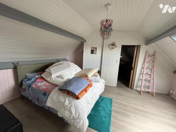 MAISON INDIVIDUELLE EN SEMI PLAIN-PIED 