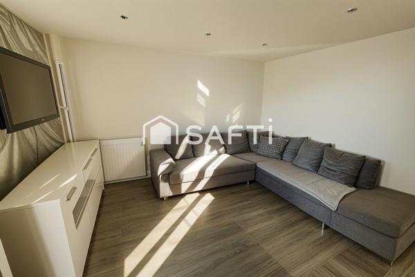 Deux pièces avec balcon, parking, cave à 3 min du RER