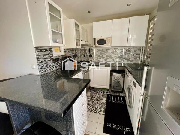 Deux pièces avec balcon, parking, cave à 3 min du RER