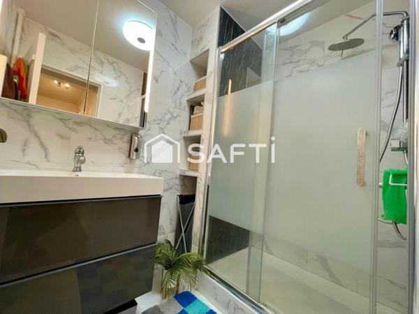 Deux pièces avec balcon, parking, cave à 3 min du RER