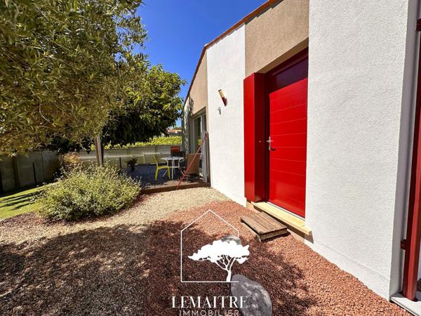 Charmant plain pied proche centre