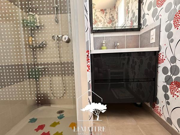 Charmant plain pied proche centre