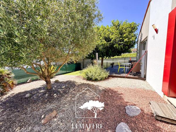 Charmant plain pied proche centre